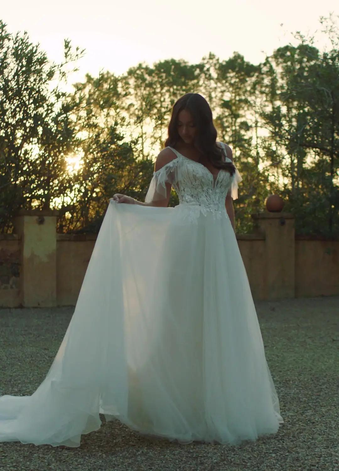 Mesmerizing Boho Wedding Dress with Flutter Sleeves Cynthia $1 autoplay loop mute thumbnail