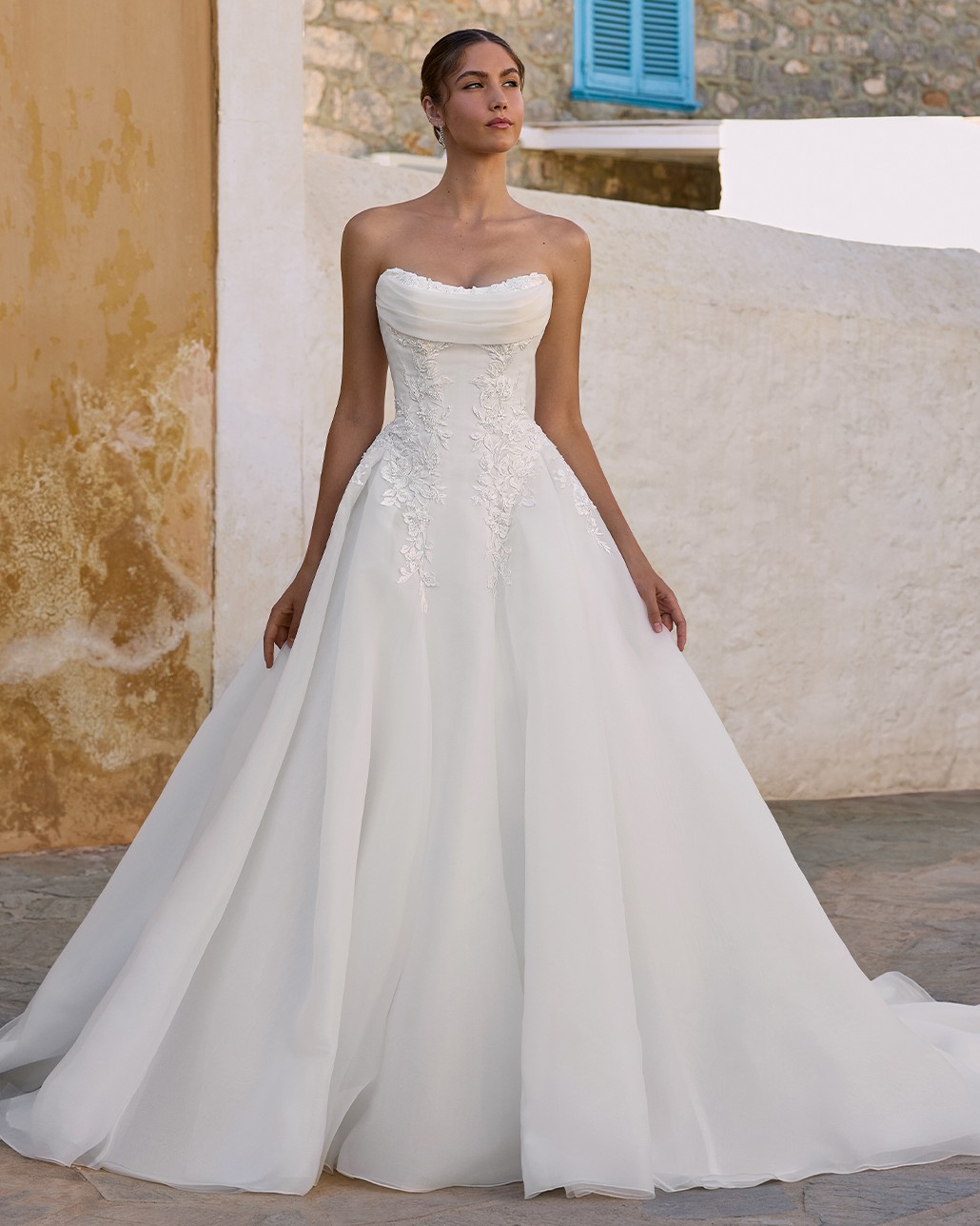 Brunette model in white wedding dress