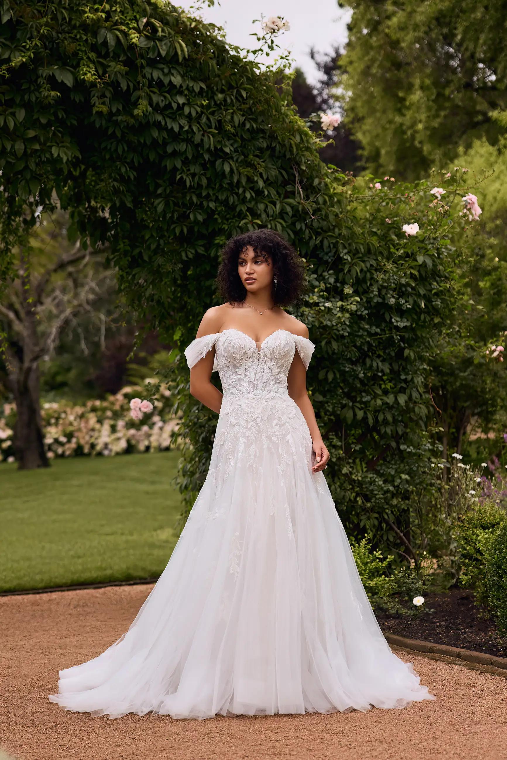 Ethereal Wedding Dress with Beaded Semi-Sheer Bodice Gueniver $1 autoplay loop mute thumbnail